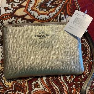 Coach hand purse. NWT